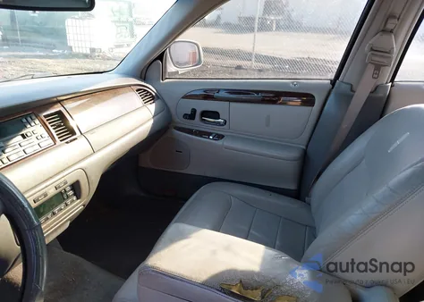 1998 Lincoln Town Car Signature из США, поврежденный, VIN 1LNFM82WXWY655710